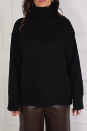 Pull con bottone gioiello