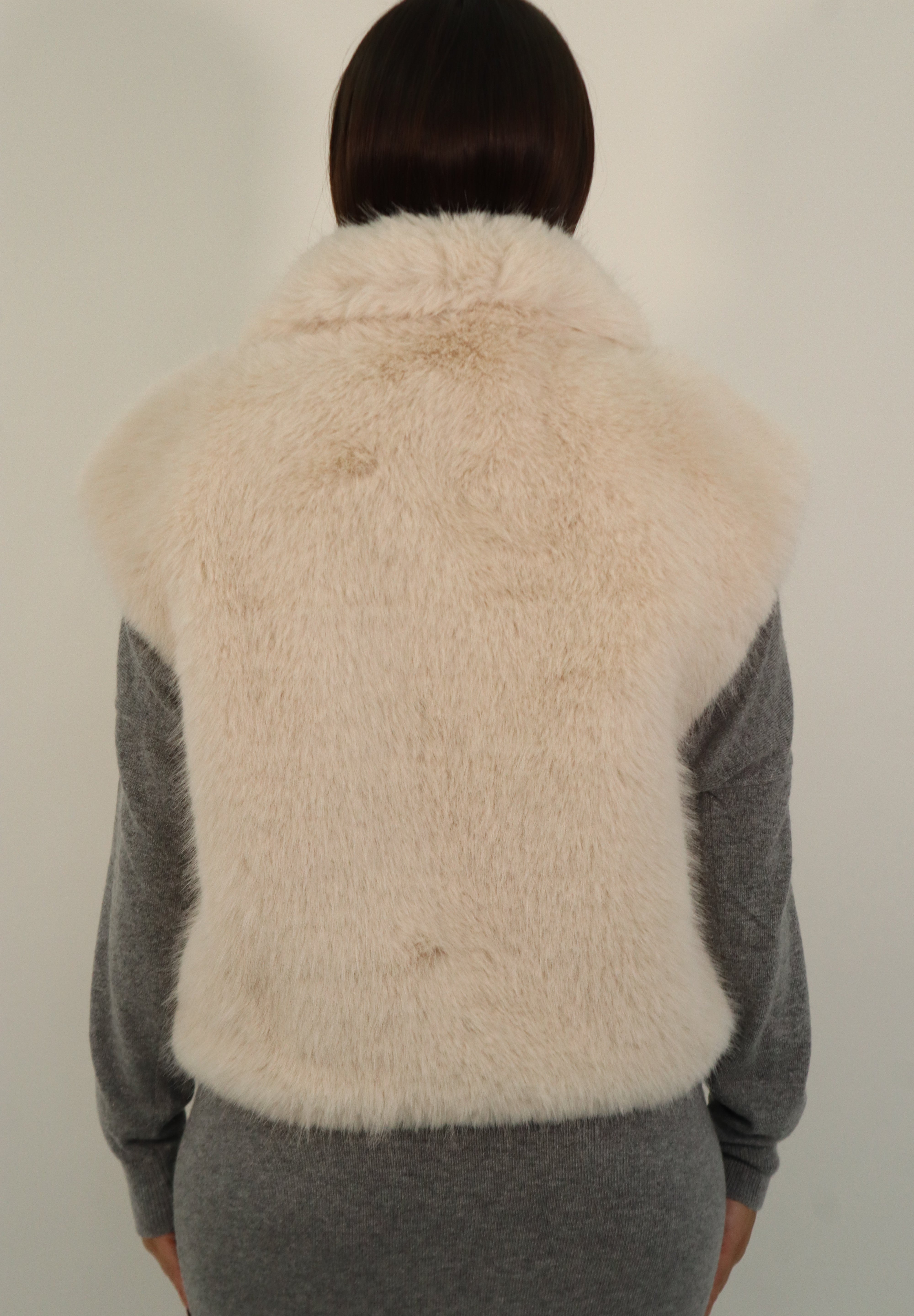 SLEEVELESS FUR COAT