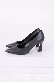 DÉCOLLETÉ NERO IN PELLE